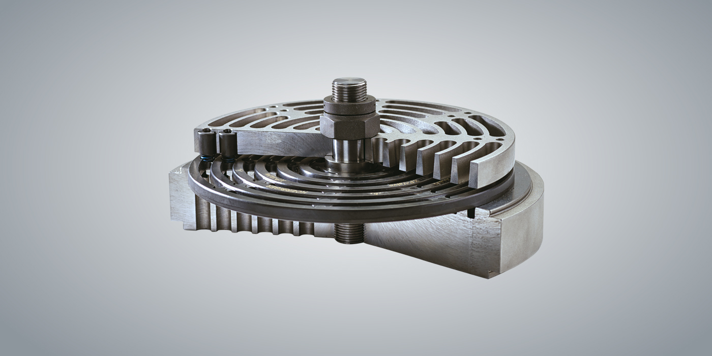 XP - Profiled Plate Valve for process gas XP - Profiled Plate Valve for process gas cut with PowerPEEK and a refinery in the background